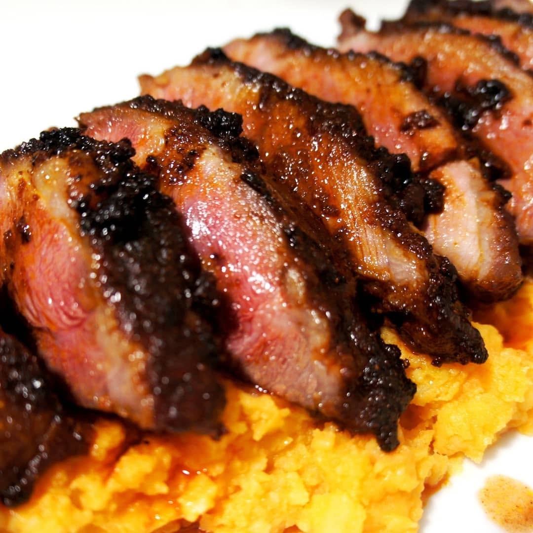 Presa Ibérica Marinada con Patatas Revolconas